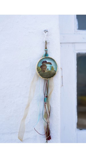 Ceramic charm hanging with houses design