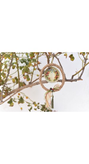 Ceramic charm pendant with pomegranate wreath design