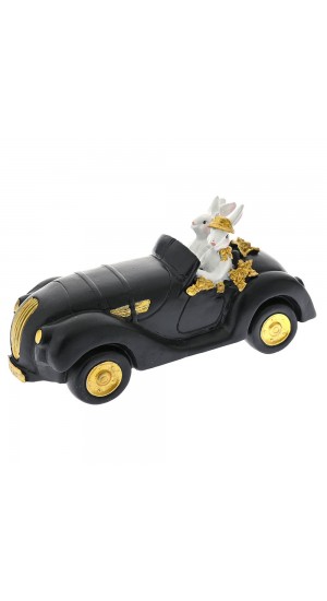 EASTER BLACK AND WHITE POLYRESIN BUNNY RIDING A CAR 23X8X12CM
